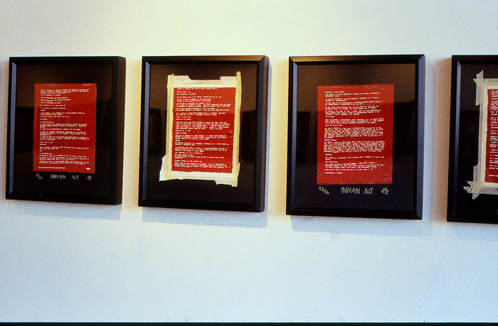 2002 11 08 Indian Acts Indian Act Nadia Myre Beaded exhibition roll 1 026 install detail showing 3 framed images