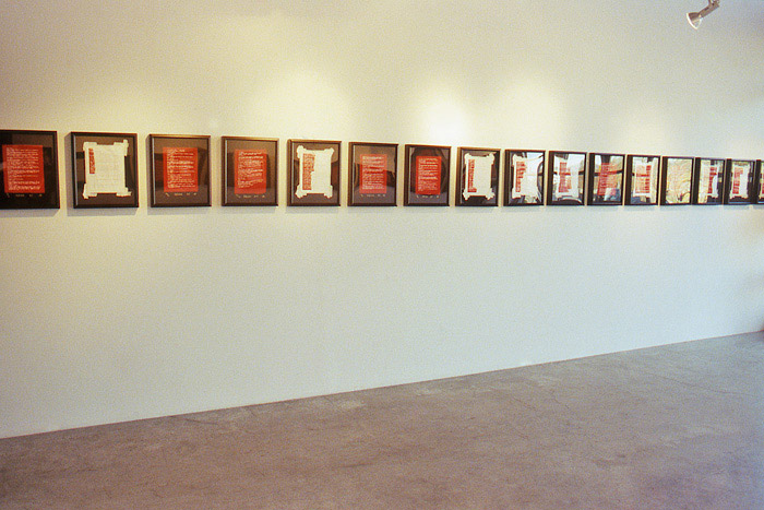 2002 11 08 Indian Acts Indian Act Nadia Myre Beaded exhibition roll 2 014 installation shot showing east wall row of framed images