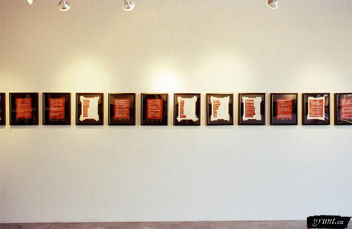 2002 11 08 Indian Acts Indian Act Nadia Myre Beaded exhibition roll 2 019 installation shot showing west wall row of framed images