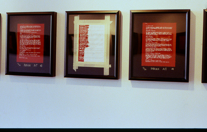 2002 11 08 Indian Acts Indian Act Nadia Myre Beaded exhibition roll 1 031 install detail showing 3 framed images